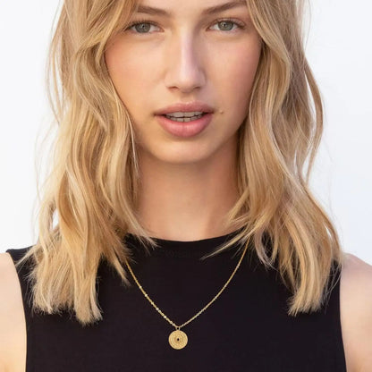 GOLDEN COMPASS NECKLACE